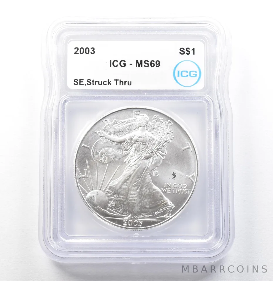 2003 American Silver Eagle Mint Error Struck Thru MS69 ICG *0032
