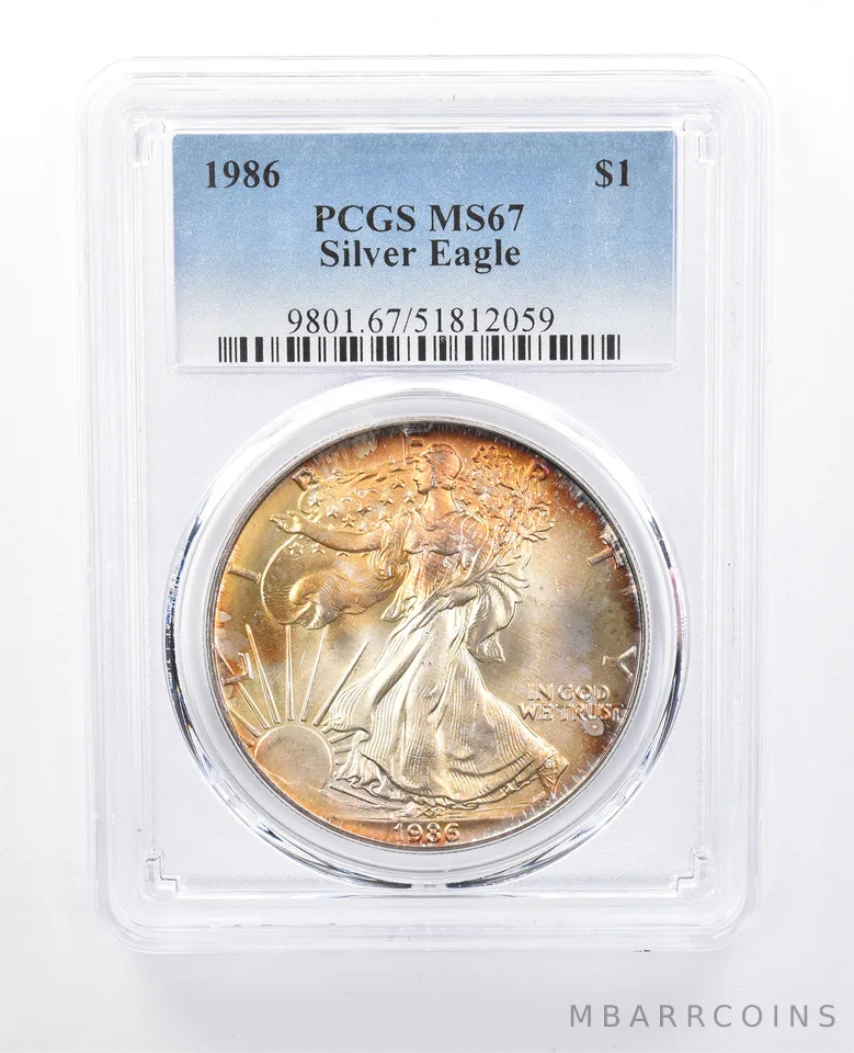 1986 American Silver Eagle MS67 PCGS Yellow Tone *8180