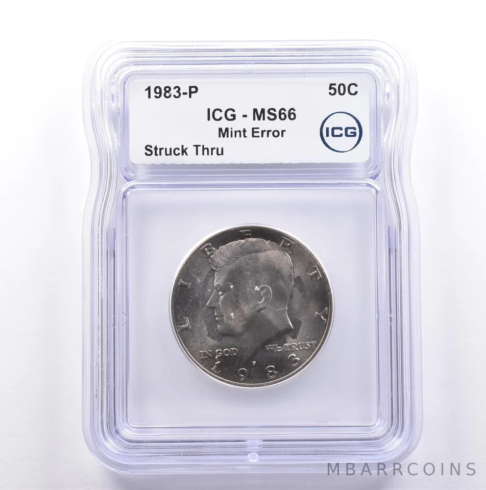 1983-P Kennedy Half Dollar Mint Error Struck Thru MS66 ICG *9070