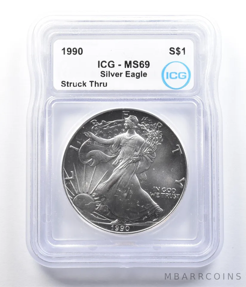1990 American Silver Eagle Mint Error Struck Thru MS69 ICG *1080
