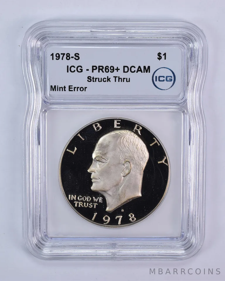 1978-S Eisenhower $1 Mint Error Struck Thru PR69+ DCAM ICG
