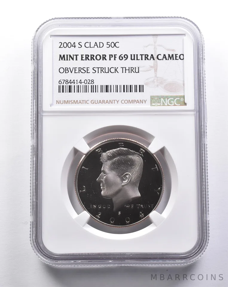 Error PF69 UCAM 2004-S Clad Kennedy Silver Half Dollar OBV Struck Thru NGC *3140