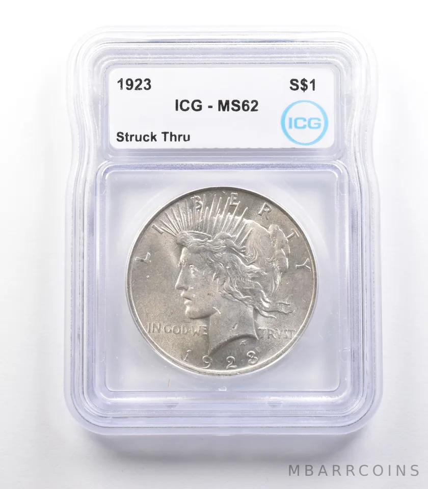 1923 Peace Silver Dollar Mint Error Struck Thru MS62 ICG *2346