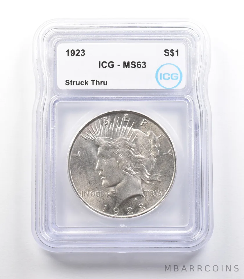 1923 Peace Silver Dollar Mint Error Struck Thru MS63 ICG *2366