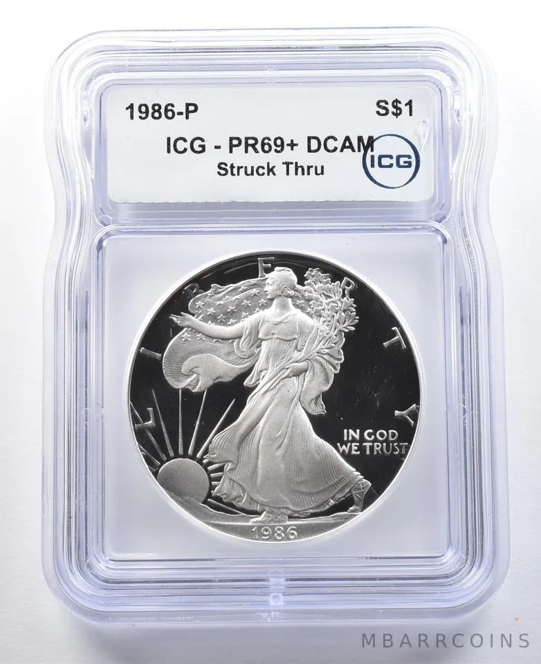 1986-S American Silver Eagle Mint Error Struck Thru PR69+ DCAM ICG *3304