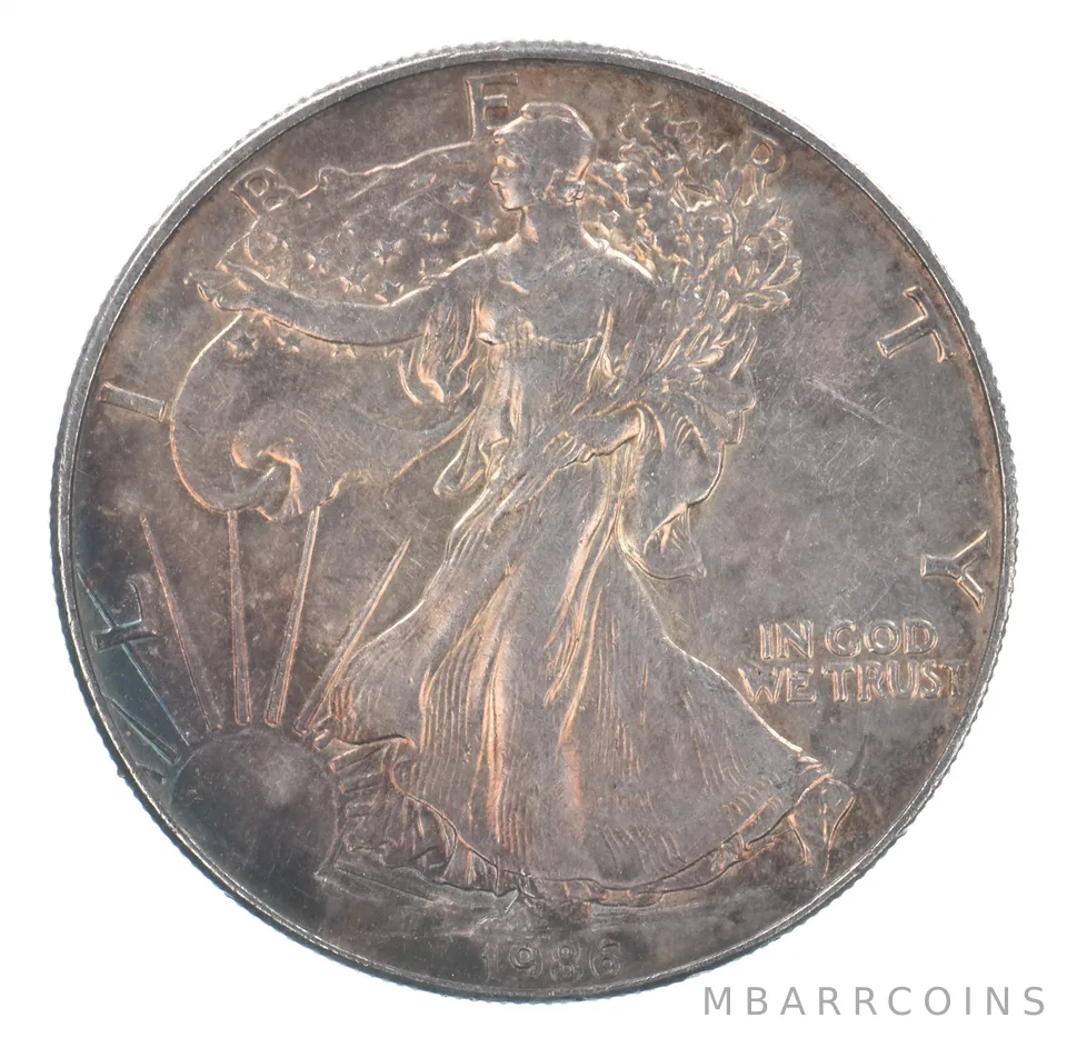 Beautiful Toned - 1986 American Silver Eagle 1 Troy Oz .999 Fine Silver *044