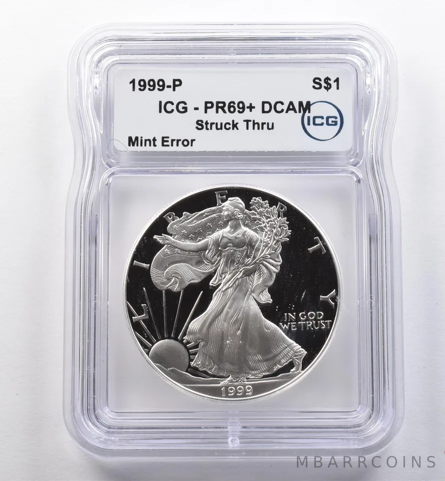 1999-P American Silver Eagle Mint Error Struck Thru PR69+ DCAM ICG *2234