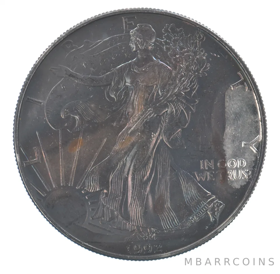 Beautiful Toned - 1992 American Silver Eagle 1 Troy Oz .999 Fine Silver *056