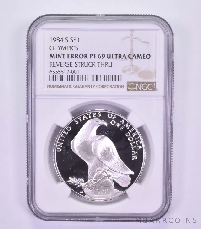 Mint Error PF69 UCAM 1984-S Los Angeles Olympics - REV Struck Thru - NGC *9610