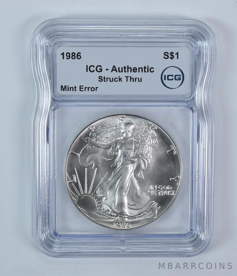 1986 American Silver Eagle Mint Error Struck Thru Authentic ICG