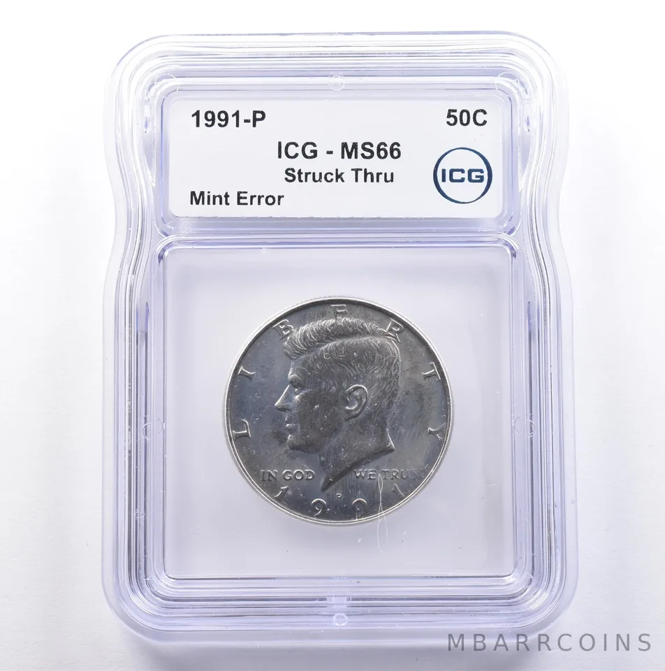 1991-P Kennedy Half Dollar Mint Error Struck Thru MS66 ICG *9073
