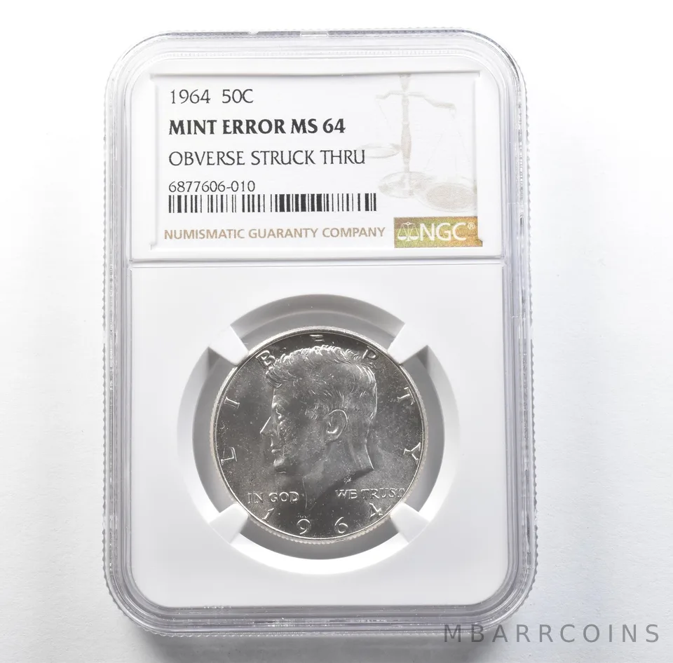 1964 Kennedy Half Dollar Mint Error Obverse Struck Thru MS64 NGC *3117