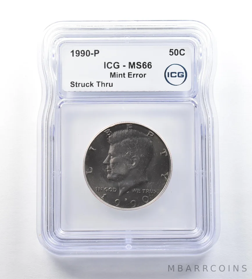 1990-P Kennedy Half Dollar Mint Error Struck Thru MS66 ICG *0680