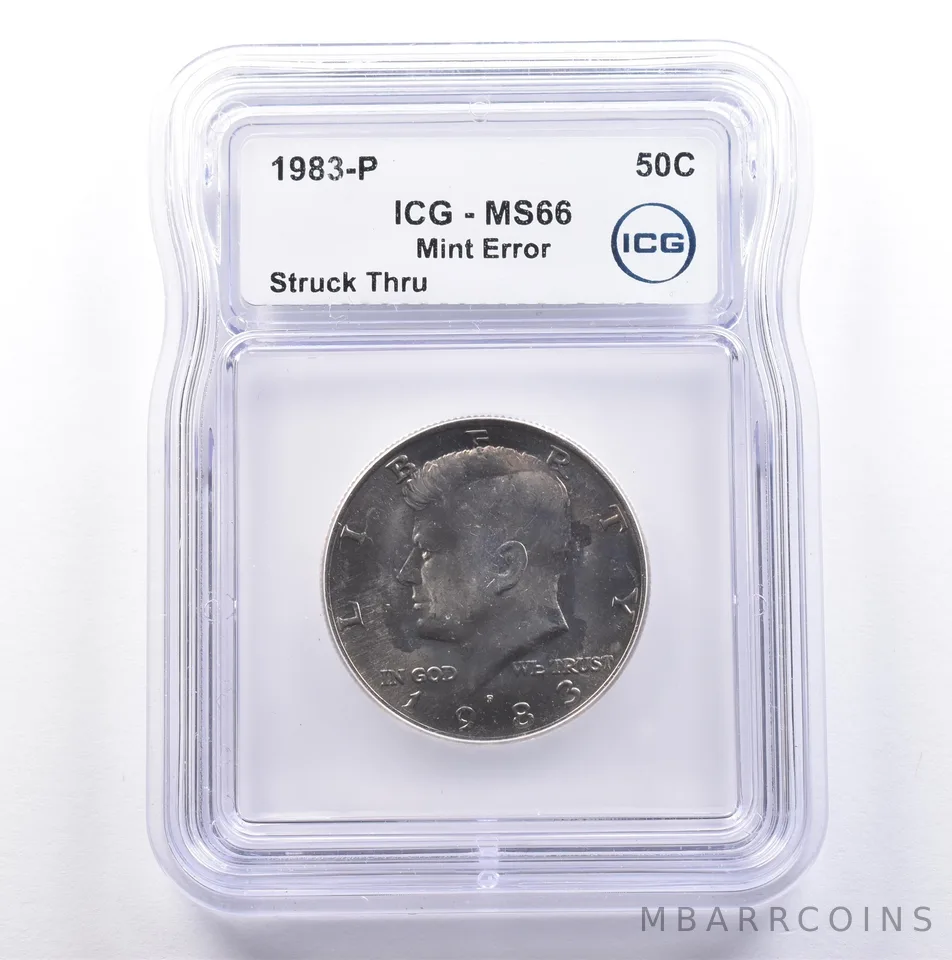 1983-P Kennedy Half Dollar Mint Error Struck Thru MS66 ICG *9103