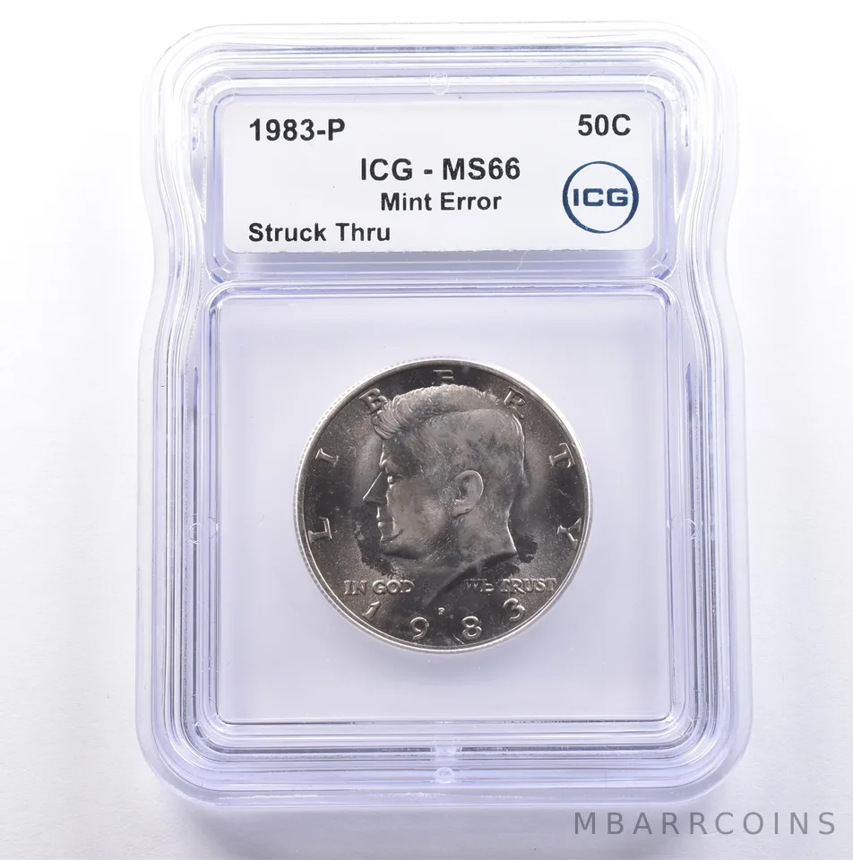1983-P Kennedy Half Dollar Mint Error Struck Thru MS66 ICG *9069