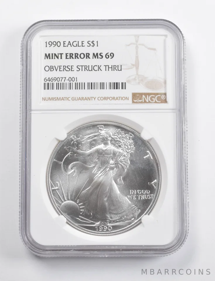 Mint Error MS69 1990 American Silver Eagle OBV Struck Thru NGC a3458