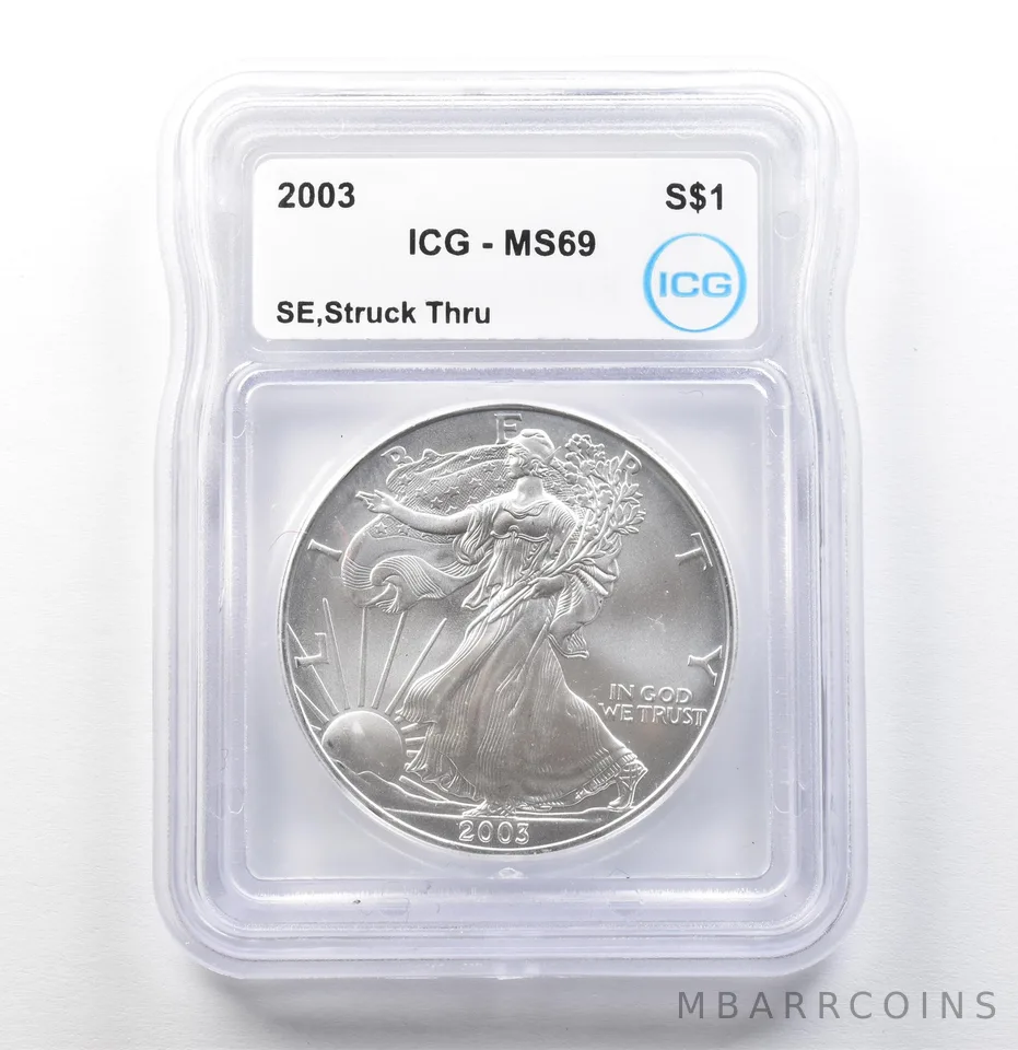 2003 American Silver Eagle Mint Error Struck Thru MS69 ICG *0037