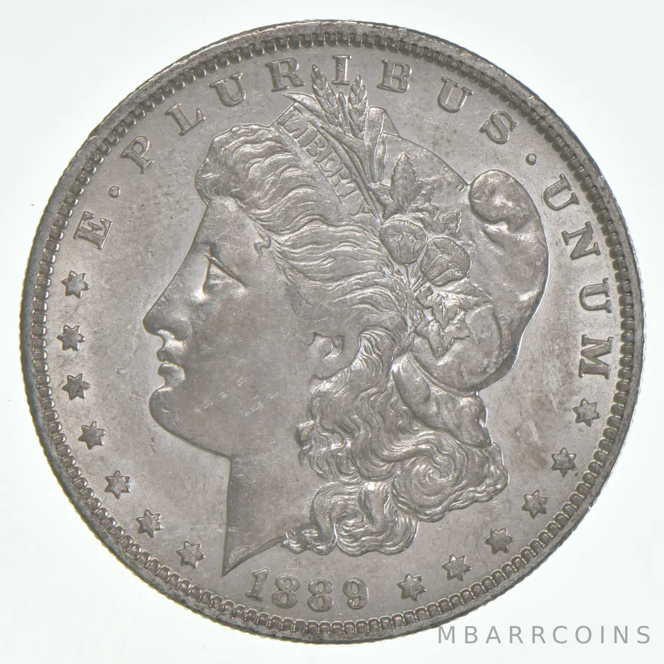 AU+ 1889-O Morgan Silver Dollar (1 coin)