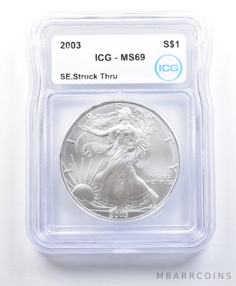 2003 American Silver Eagle Mint Error Struck Thru MS69 ICG a0933