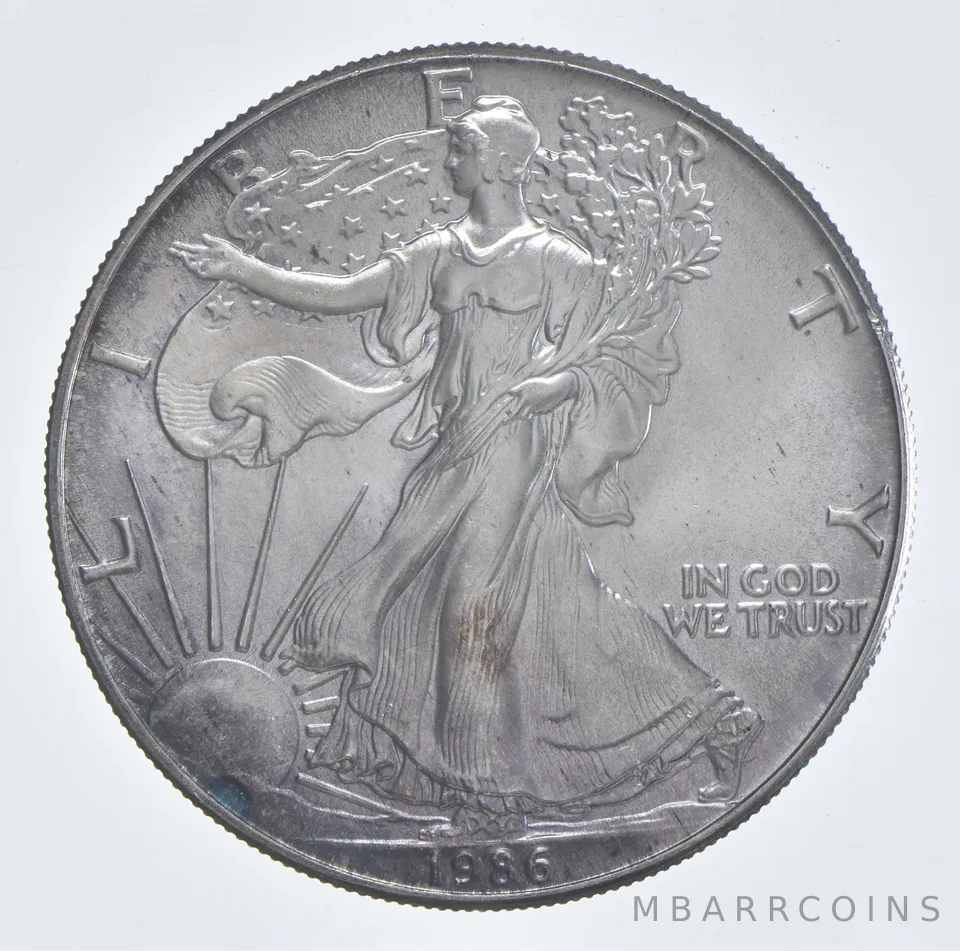 Better Date 1986 American Silver Eagle 1 Troy Oz .999 Fine Silver *997