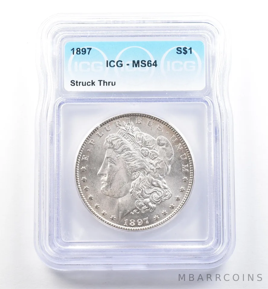 1897 Morgan Silver Dollar Mint Error Struck Thru MS64 ICG *6077