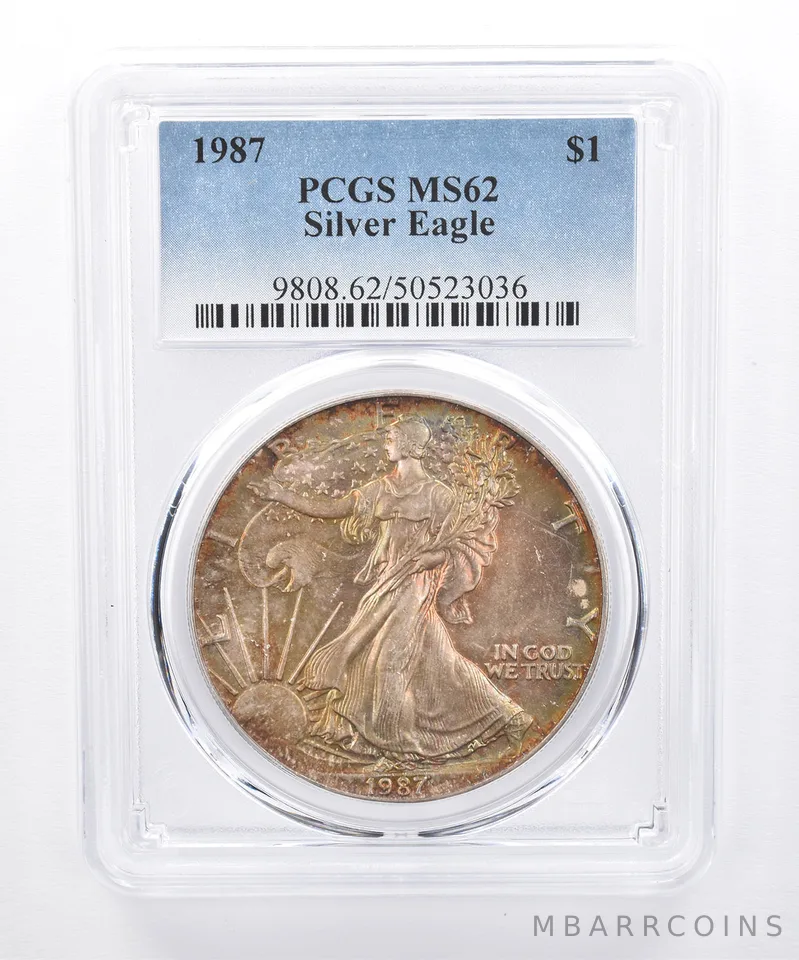 1987 American Silver Eagle MS62 PCGS Yellow/Green Tone *8504