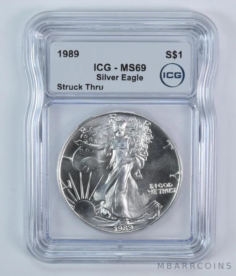 1989 American Silver Eagle Mint Error Struck Thru MS69 ICG
