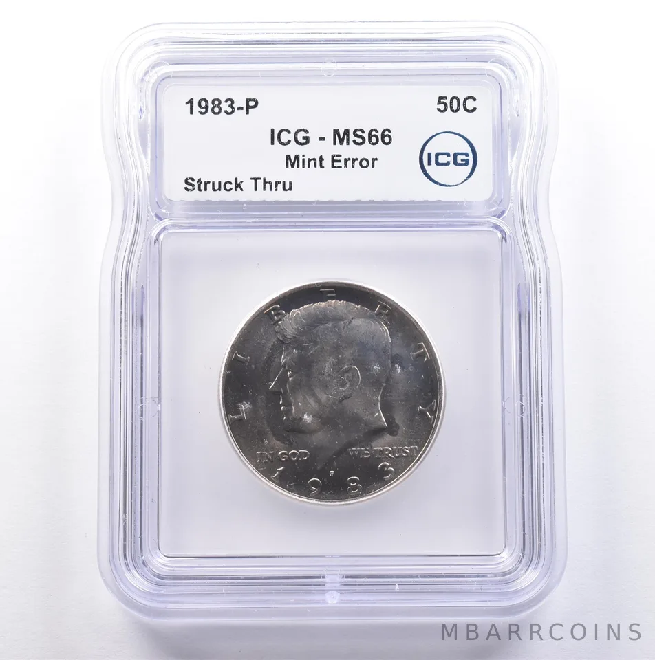 1983-P Kennedy Half Dollar Mint Error Struck Thru MS66 ICG *9101