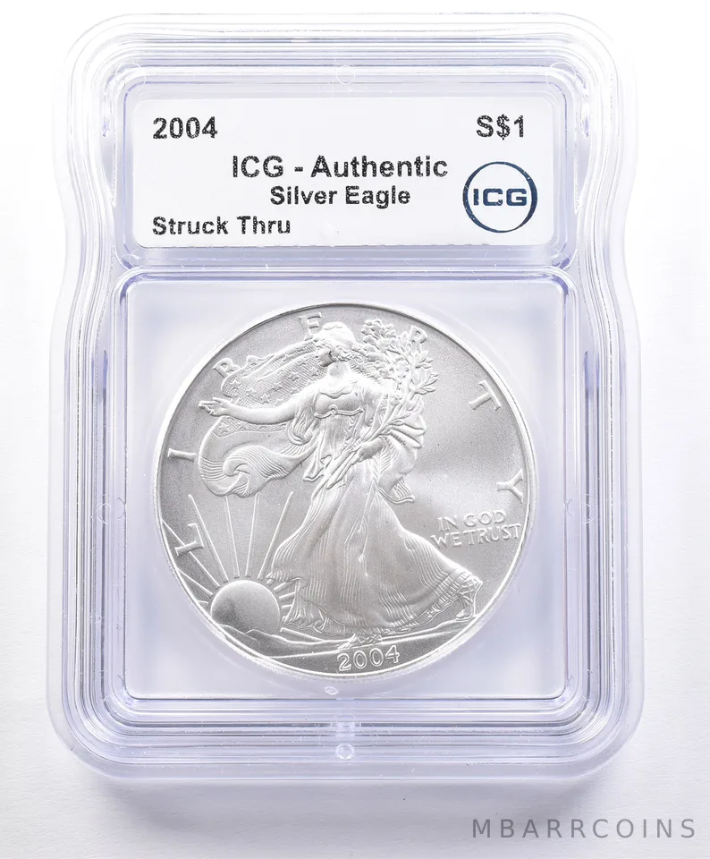 ERROR 2004 American Silver Eagle Struck Thru ICG a2356