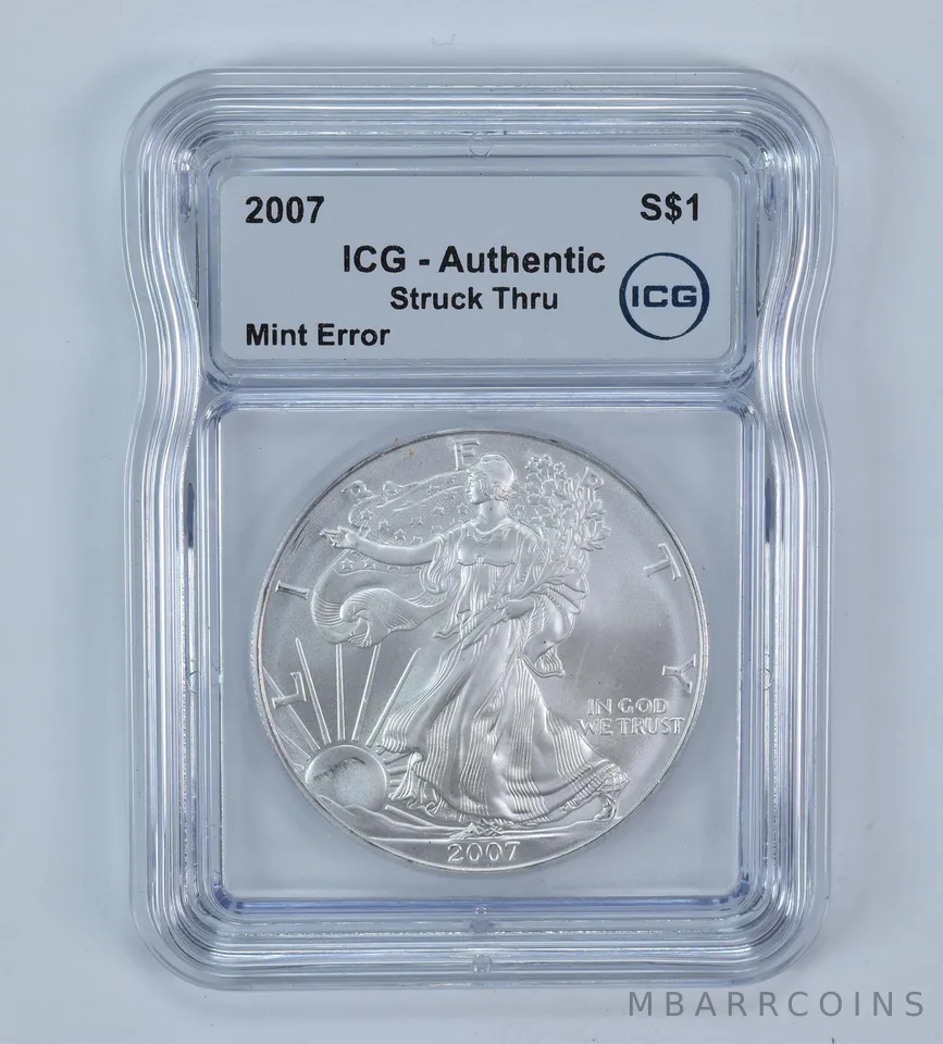 2007 American Silver Eagle Mint Error Struck Thru Authentic ICG