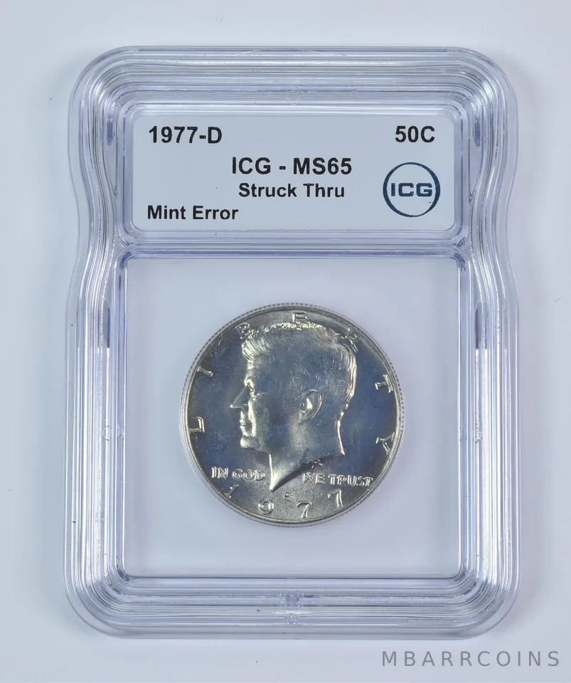 1977-D Kennedy Half Dollar Mint Error Struck Thru MS65 ICG *9341