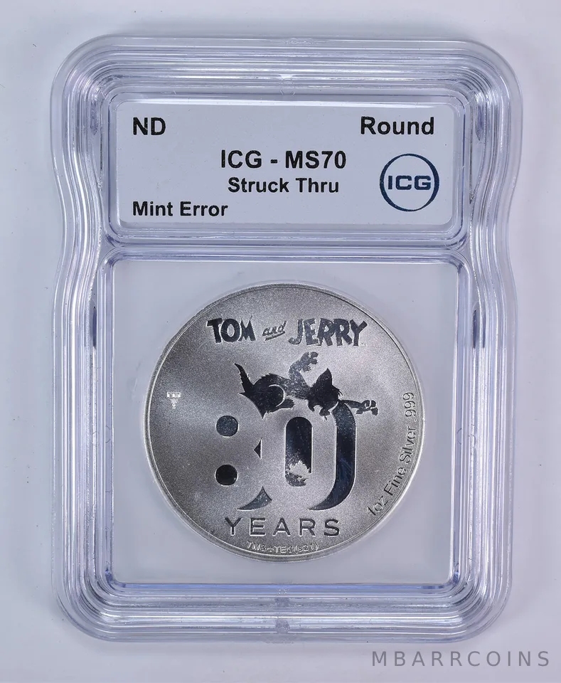 (ND) 1 Oz Silver Round Tom And Jerry Mint Error Struck Thru MS70 ICG