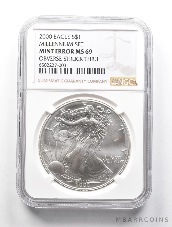 MINT ERROR MS69 2000 American Silver Eagle OBV Struck Thru Millennium NGC a0670