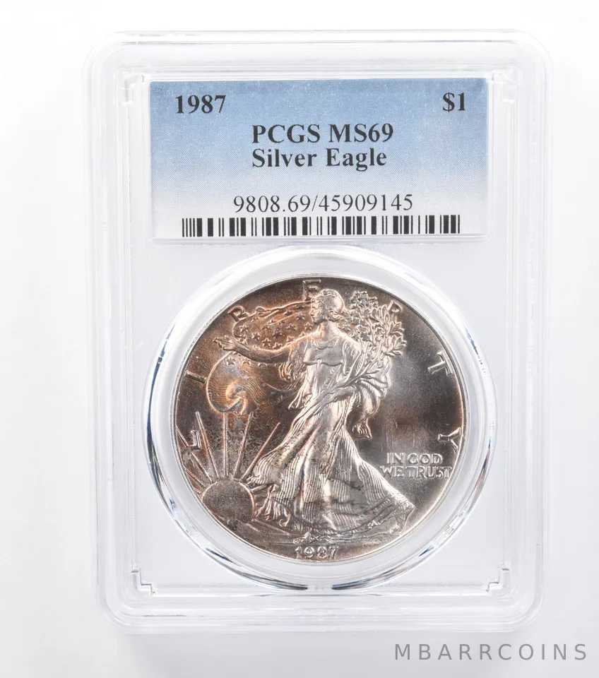 1987 American Silver Eagle MS69 PCGS Mottled Amber Tone *7760