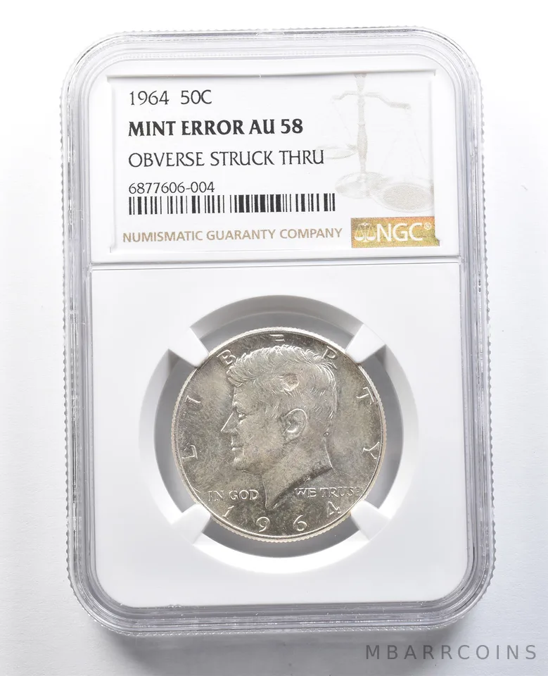 1964 Kennedy Half Dollar Mint Error Obverse Struck Thru AU58 NGC *8226
