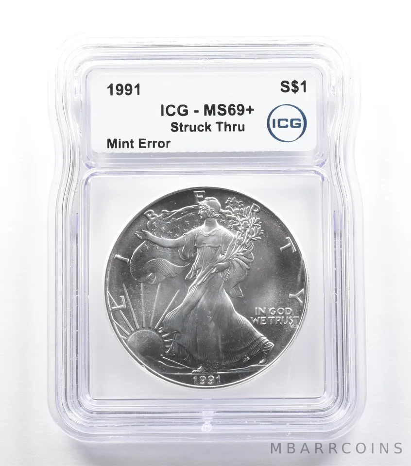 1991 American Silver Eagle Mint Error Struck Thru MS69+ ICG *5559