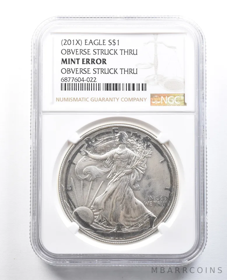 (201x) American Silver Eagle Mint Error Obverse Struck Thru NGC *8270