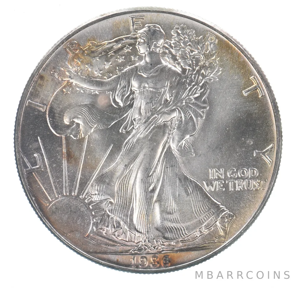 Beautiful Toned - 1986 American Silver Eagle 1 Troy Oz .999 Fine Silver *127