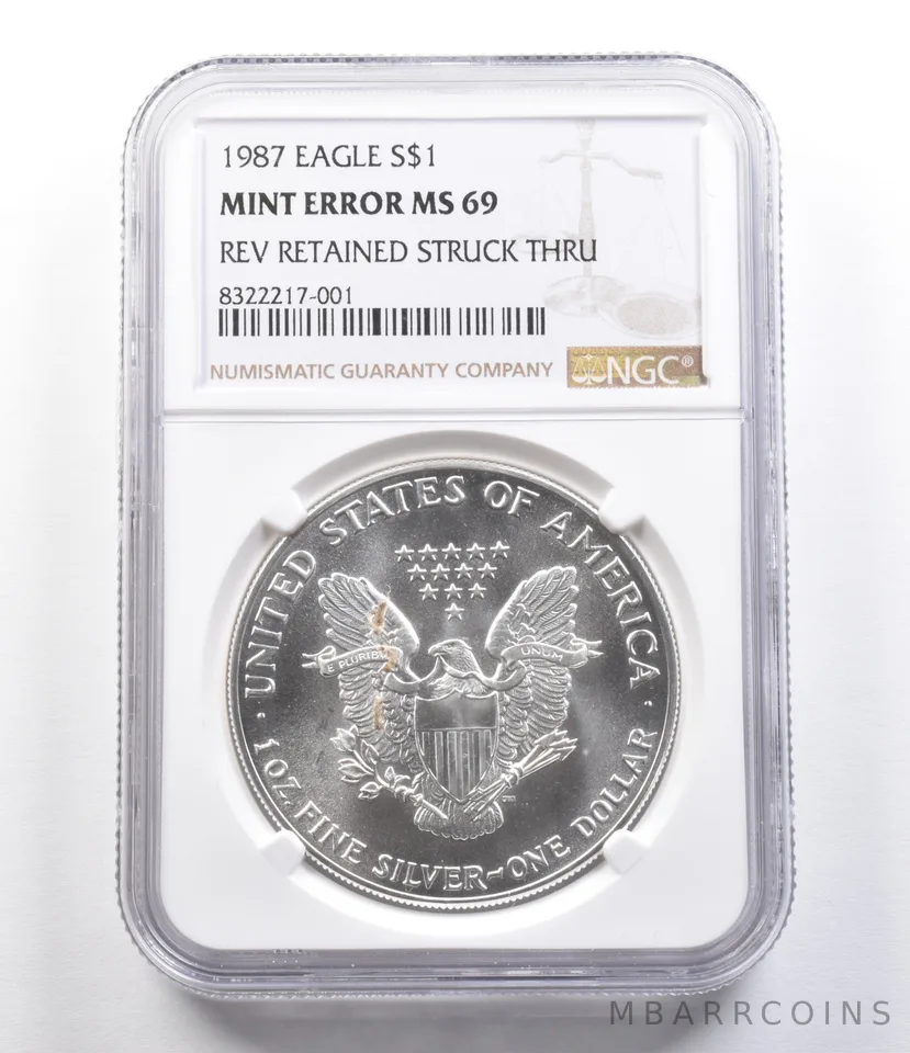 1987 Silver Eagle Mint Error Reverse Retained Struck Thru MS69 NGC a2539