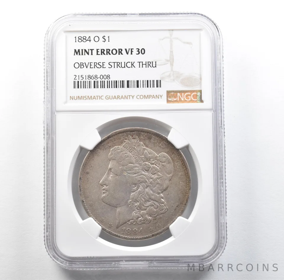 1884-O Morgan Silver Dollar Mint Error Obverse Struck Thru VF30 NGC *3180