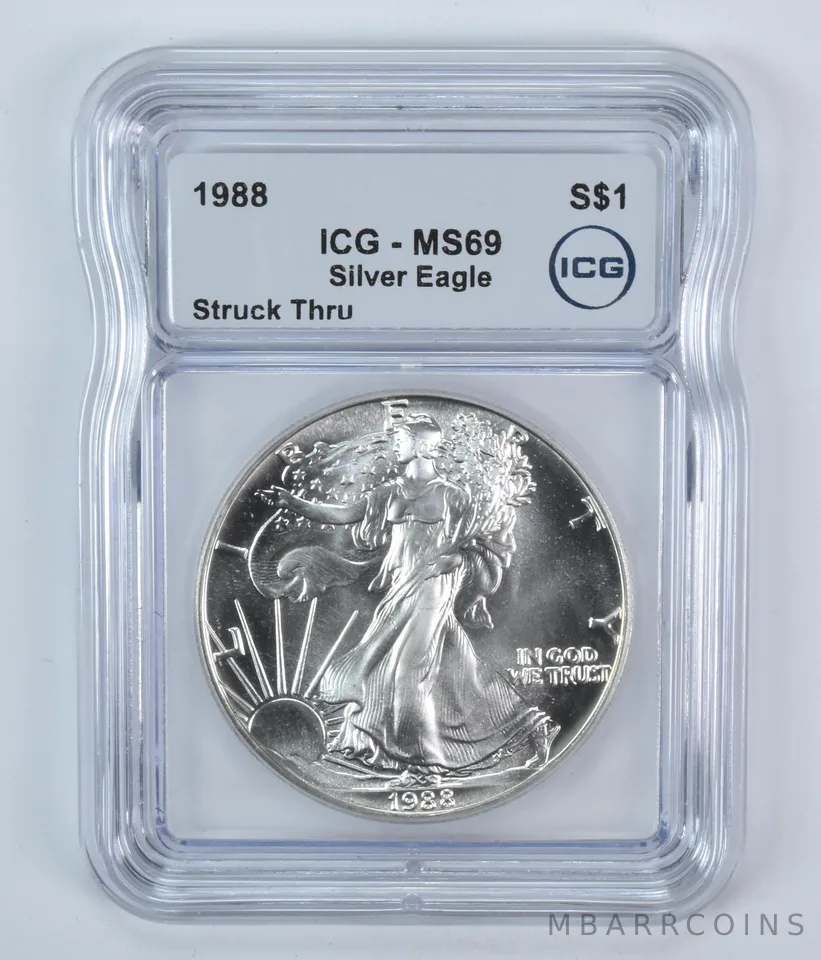 1988 American Silver Eagle Mint Error Struck Thru MS69 ICG