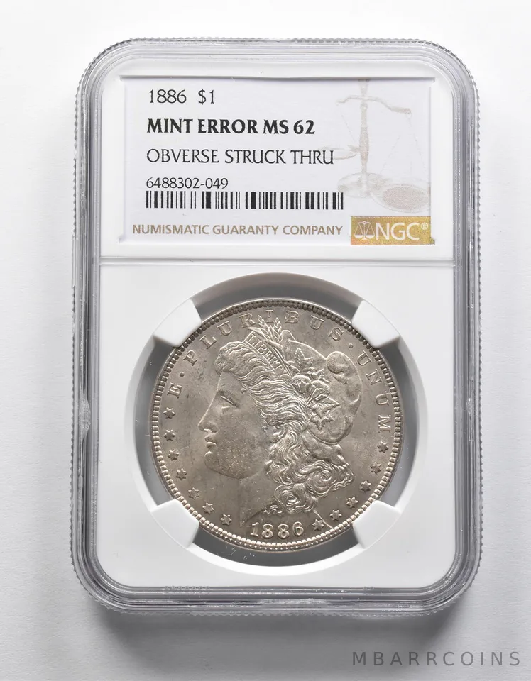 Mint Error MS62 1886 Morgan Silver Dollar OBV Struck Thru NGC a1914